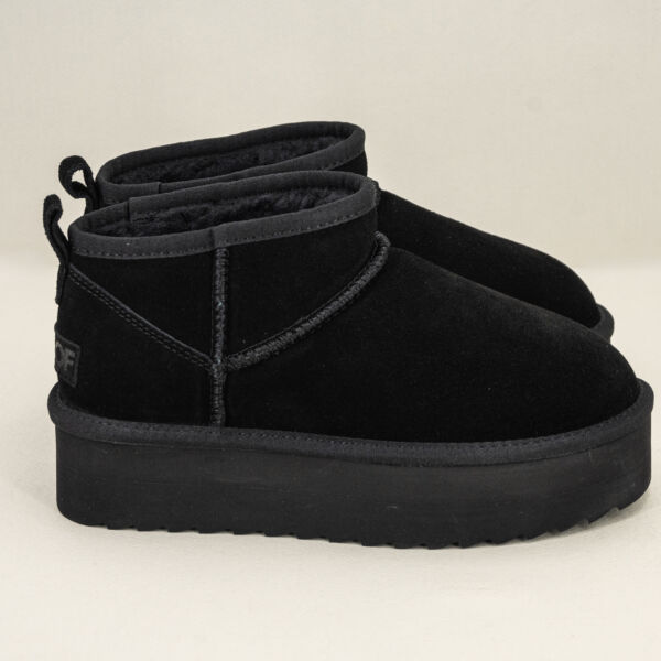 Stivaletto alla caviglia con pelo nero da infila re suola platform alta tipo stivale ugg