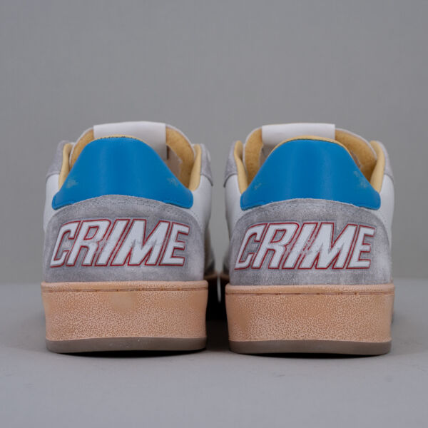 crime london sneaker uomo in vera pelle colore bianco con dettagli ghiccio e azzurro. Suola in gomma