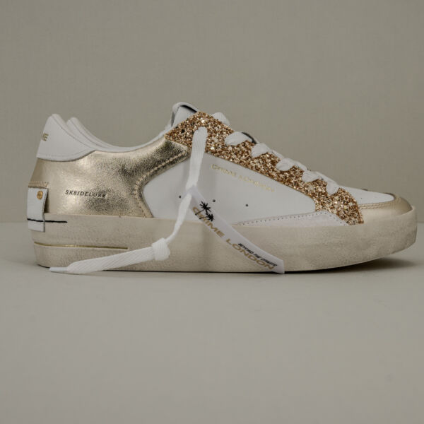 Crime London sk8 platinum sneaker donna in pelle bianca con dettagli platino e glietter dorati.