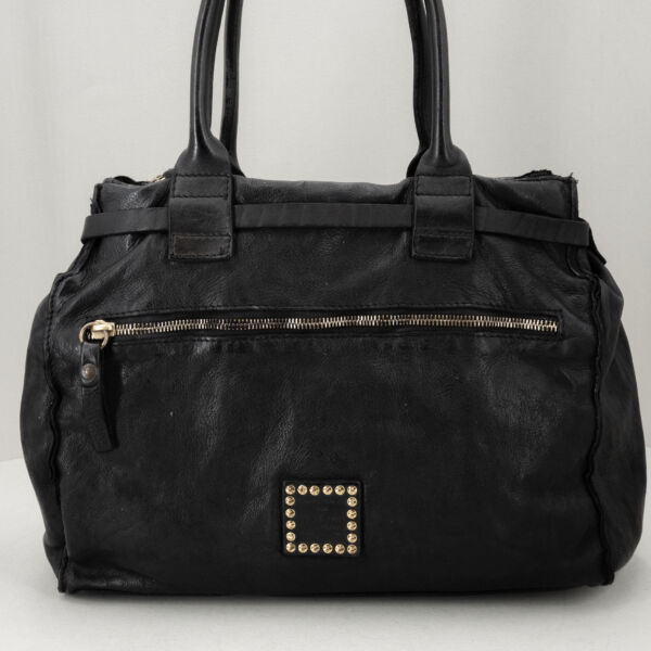 Campomaggi borsa a spalla shopper con borchie a fiore applicate a mano. Borsa donna elegante con un look inconfondibile. Stefano Ascari Spilamberto (Mo)