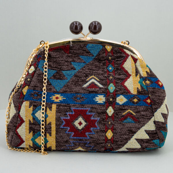 Nalì borsa in tessuto blu fantasia, chiusura clic clac con gioiello, da portare come pochette o con las tracollina in metallo dorato removibile.