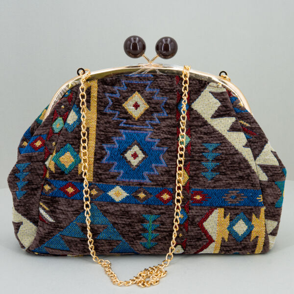 Nalì borsa in tessuto blu fantasia, chiusura clic clac con gioiello, da portare come pochette o con las tracollina in metallo dorato removibile.