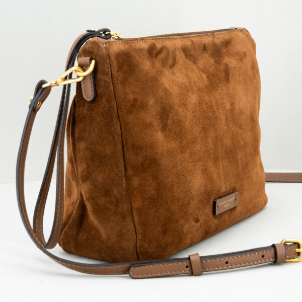 Gianni Chiarini borsetta Nora, da portare al polso con il cinturino in pelle removibile o come borsetta tracolla. Borsa color cognac in pelle scamosciata. Stefano Ascari spilamberto (mo)