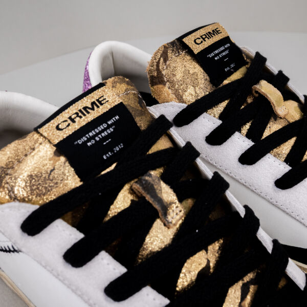 Crime London Distressed Goldrush, sneaker donna in pelle bianca dettagli glitterati rosa e neri, lacci neri. Stefano Ascari spilamberto (mo)