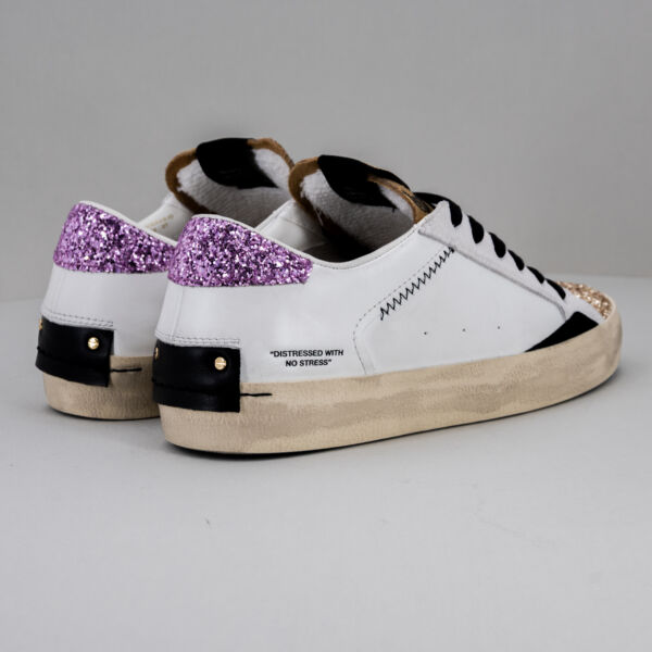 Crime London Distressed Goldrush, sneaker donna in pelle bianca dettagli glitterati rosa e neri, lacci neri. Stefano Ascari spilamberto (mo)