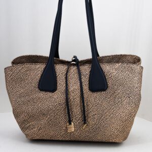 borsa da donna grande con lunghi manici. colore maculato e nero