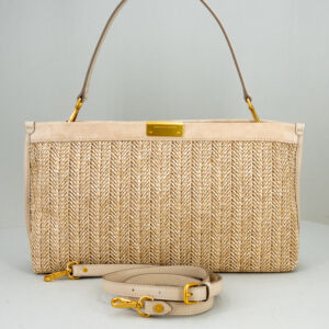 borsa da donna in paglia intrecciata a spalla con tracolla in pelle.