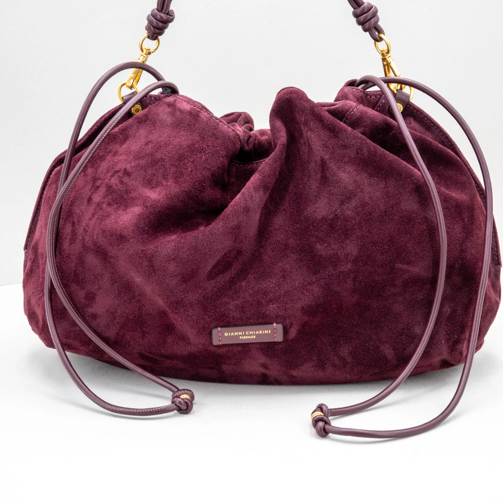 borsa da donna in camoscio bordeaux elegante
