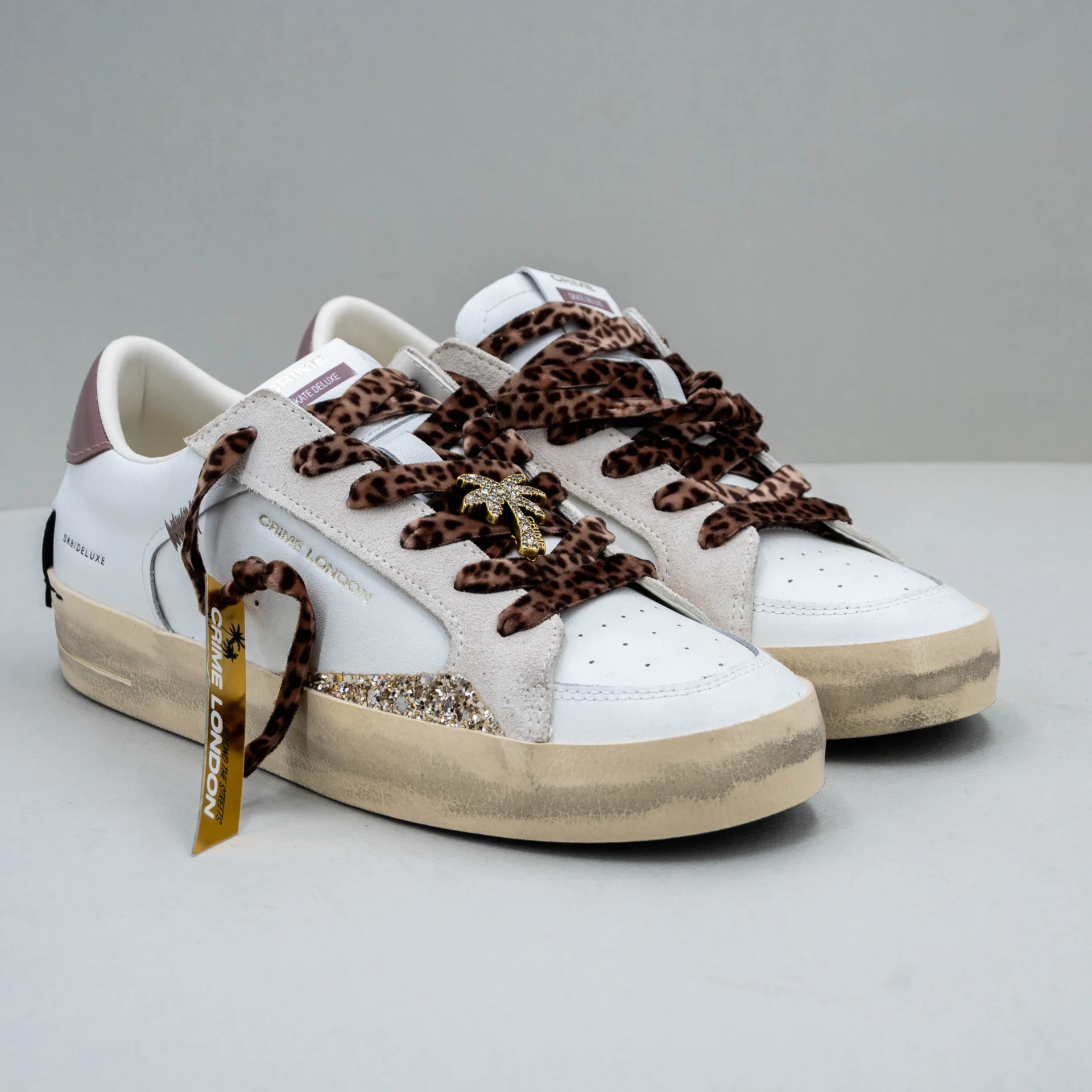 Crime London sneaker donna in pelle bianca e lacci maculati
