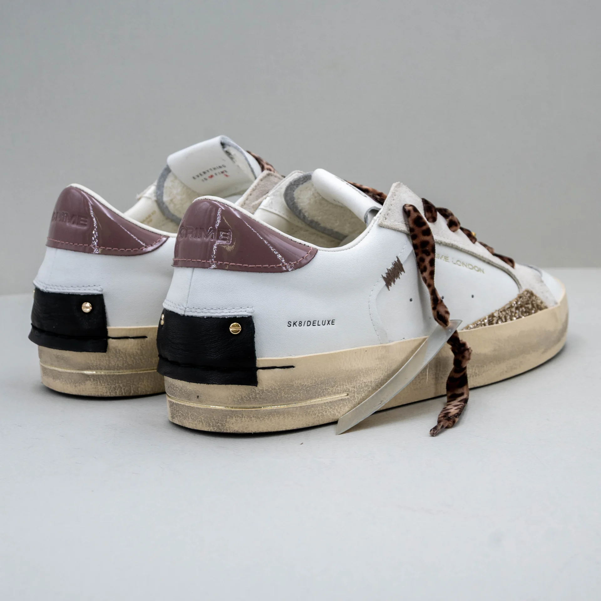 Crime London sneaker donna in pelle bianca e lacci maculati